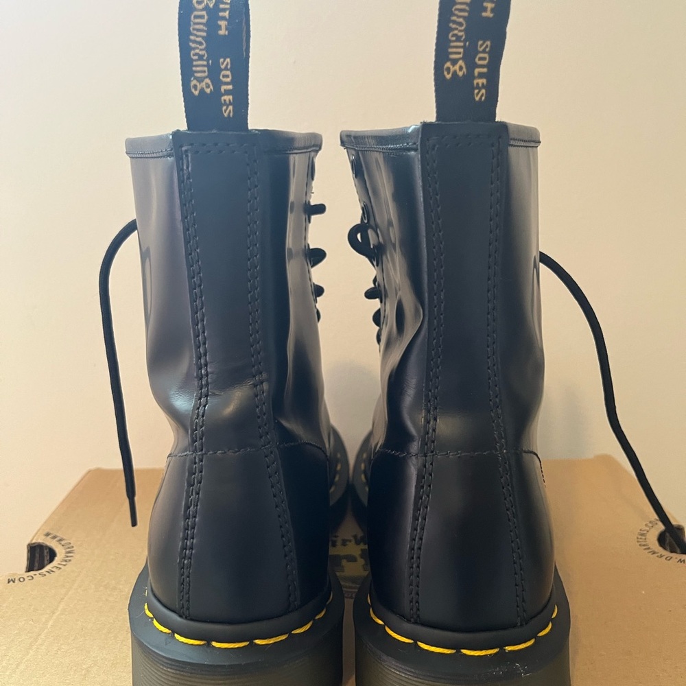 Dr. Martens Black Leather Boots with Yellow Accents